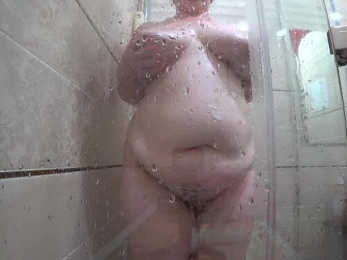Amateur milf with hairy pussy and big tits enjoying the shower